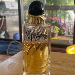 Pre-owned Bob Mackie 1.7 oz (50 ml) bottle of Masquerade Eau De Parfum.